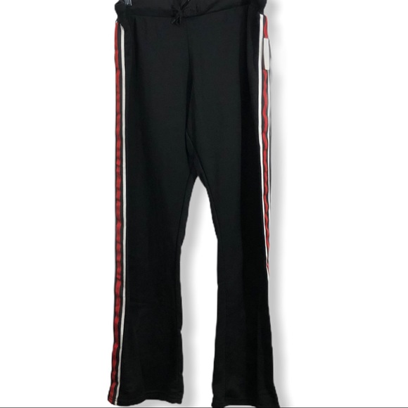 black sweatpants with red and white stripe